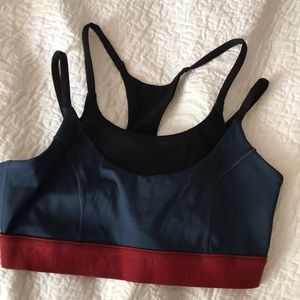 COPY - YVY PARK Women’s Sport Bra in Size Medium. In Navy with a red elastic al…